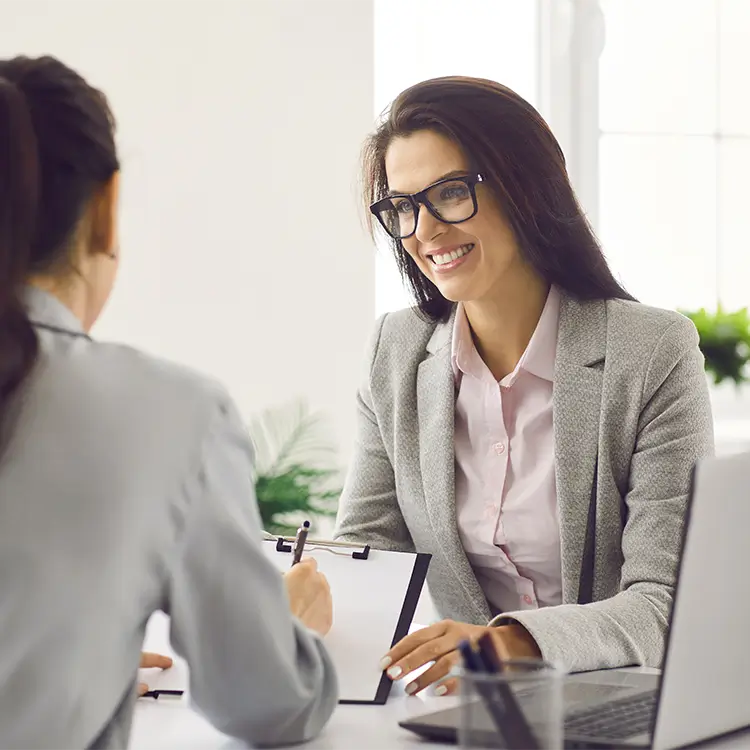 an employer getting their employee to sign a contact.